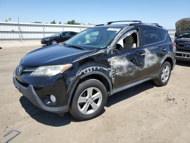 TOYOTA RAV4 XLE 2014 with VIN 2T3WFREV2EW099019 - Photo from auction