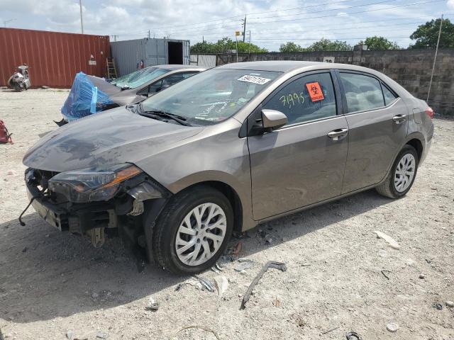 TOYOTA COROLLA L 2018 with VIN 5YFBURHE9JP809571 - Photo from auction