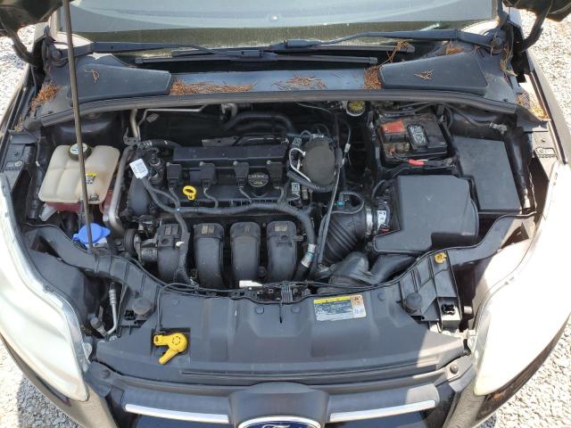 Photo 11 from auction – 2012 FORD FOCUS S with VIN 1FAHP3E20CL265200