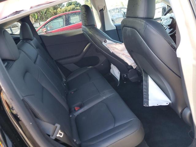 Photo 11 from auction – 2023 TESLA MODEL Y with VIN 7SAYGDEE2PA134952