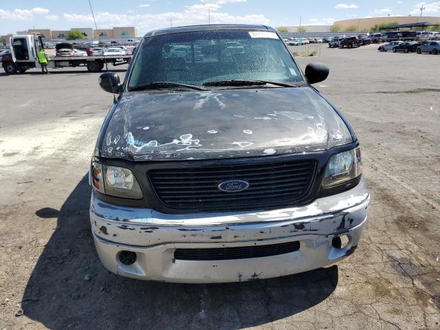 Photo 5 from auction – 2003 FORD F150 SUPER with VIN 1FTRW07303KD23995
