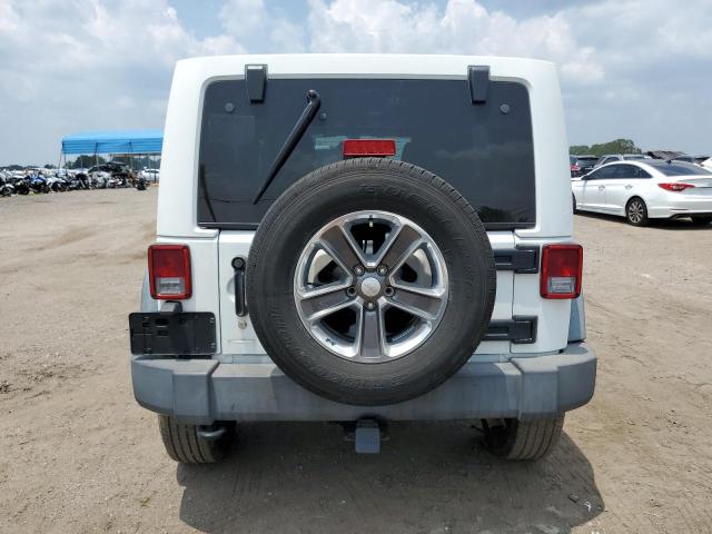 Photo 6 from auction – 2014 JEEP WRANGLER U with VIN 1C4BJWFG0EL151410
