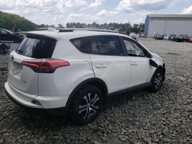 Photo 3 from auction – 2017 TOYOTA RAV4 LE with VIN JTMZFREV2HJ702115