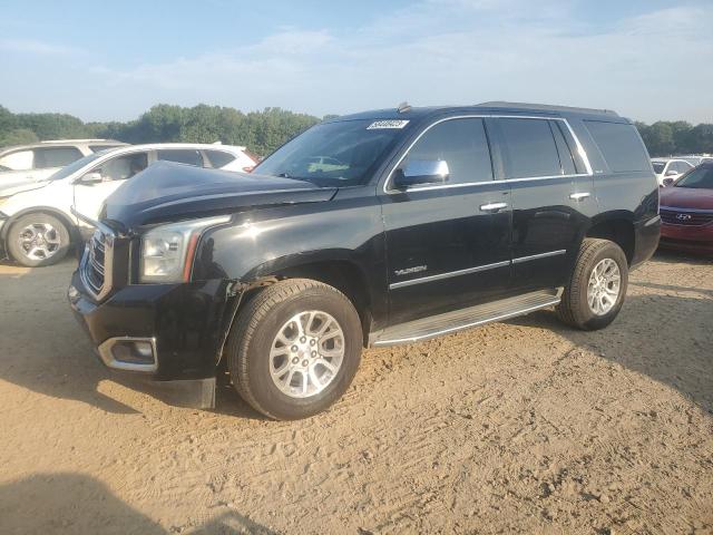 GMC YUKON SLE 2015 with VIN 1GKS2AKC2FR250459 - Photo from auction