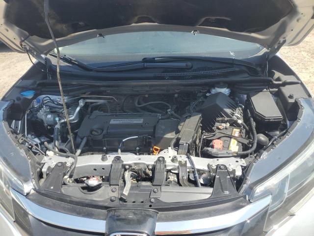 Photo 11 from auction – 2015 HONDA CR-V EX with VIN 3CZRM3H55FG705856