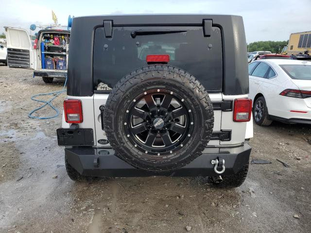Photo 6 from auction – 2010 JEEP WRANGLER U with VIN 1J4HA5H12AL156450
