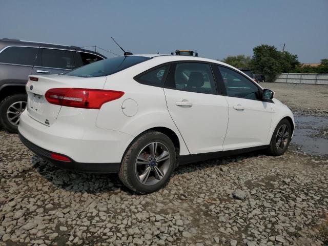 Фото 3 с аукциона – 2018 FORD FOCUS SE с VIN 1FADP3FE7JL235602