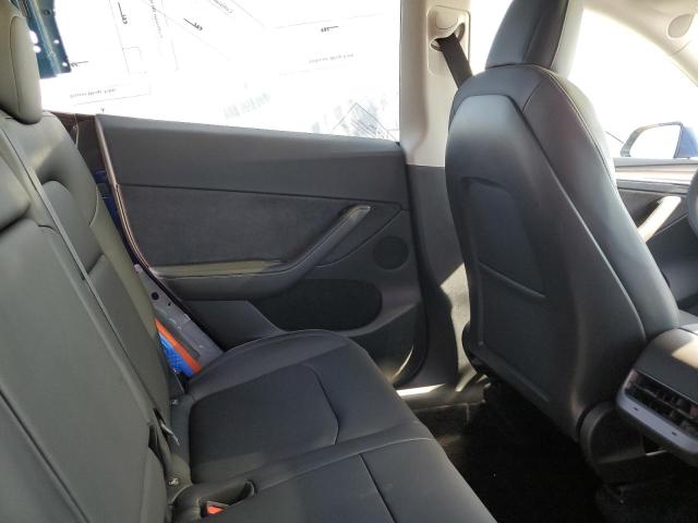 Photo 11 from auction – 2023 TESLA MODEL Y with VIN 7SAYGDEE1PF589634