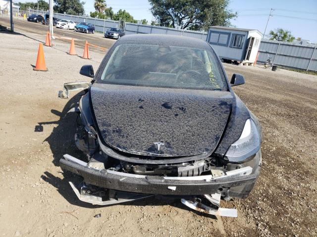 Photo 5 from auction – 2022 TESLA MODEL 3 with VIN 5YJ3E1EAXNF304421