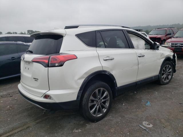Photo 3 from auction – 2018 TOYOTA RAV4 LIMIT with VIN JTMDFREV0JD243326