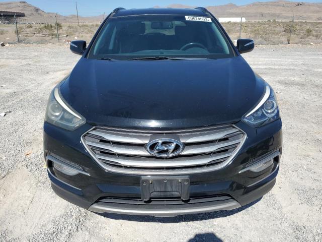 Photo 5 from auction – 2017 HYUNDAI SANTA FE S with VIN 5NMZU3LB7HH035219