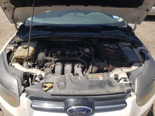 Photo 11 from auction – 2014 FORD FOCUS TITA with VIN 1FADP3N23EL175489