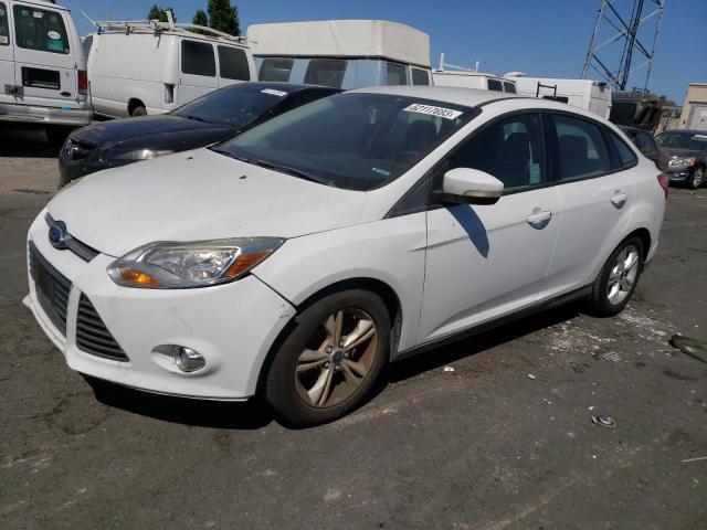 FORD FOCUS SE 2014 with VIN 1FADP3F25EL266889 - Photo from auction