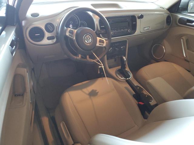Photo 8 from auction – 2014 VOLKSWAGEN BEETLE with VIN 3VWJP7AT5EM601651