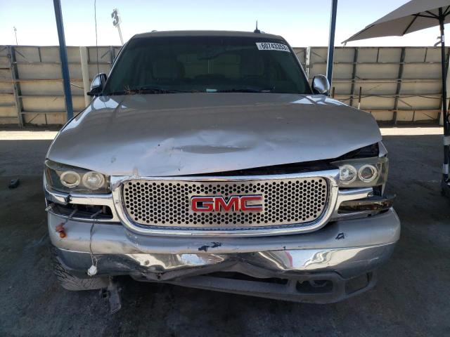 Photo 5 from auction – 2003 GMC YUKON with VIN 1GKEC13V13R267954