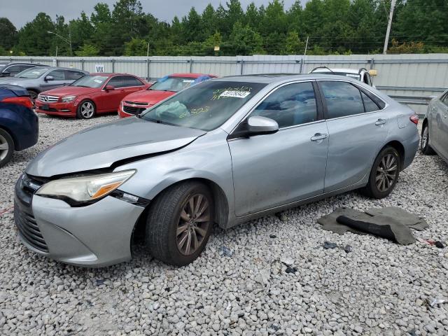 TOYOTA CAMRY LE 2016 with VIN 4T1BF1FK1GU529865 - Photo from auction