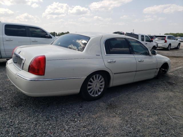 Photo 3 from auction – 2004 LINCOLN TOWN CAR U with VIN 1LNHM83WX4Y682247