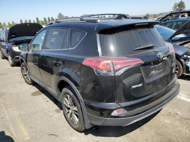 Photo 2 from auction – 2017 TOYOTA RAV4 XLE with VIN 2T3RFREV5HW567049