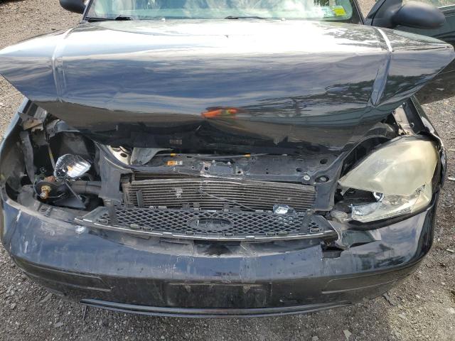 Photo 11 from auction – 2007 FORD FOCUS ZX4 with VIN 1FAFP34N87W309516