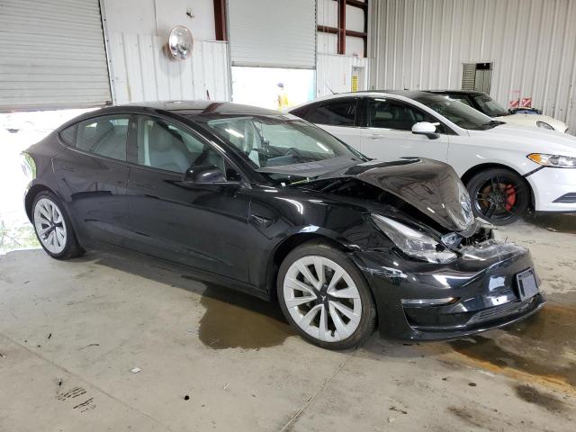 Photo 4 from auction – 2022 TESLA MODEL 3 with VIN 5YJ3E1EA2NF190737