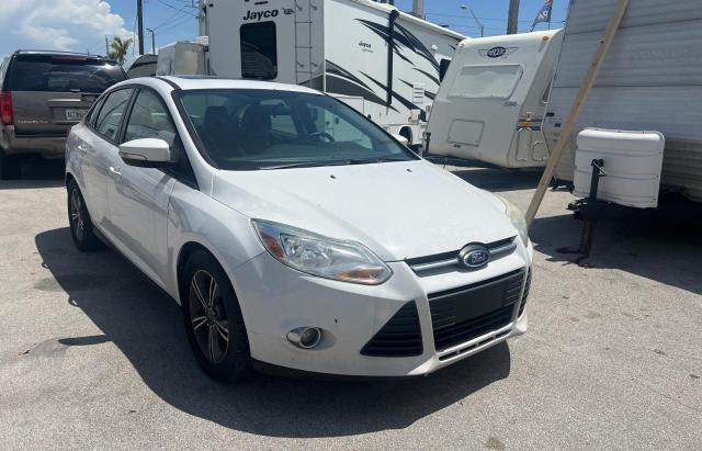 FORD FOCUS SE 2014 with VIN 1FADP3F26EL424284 - Photo from auction