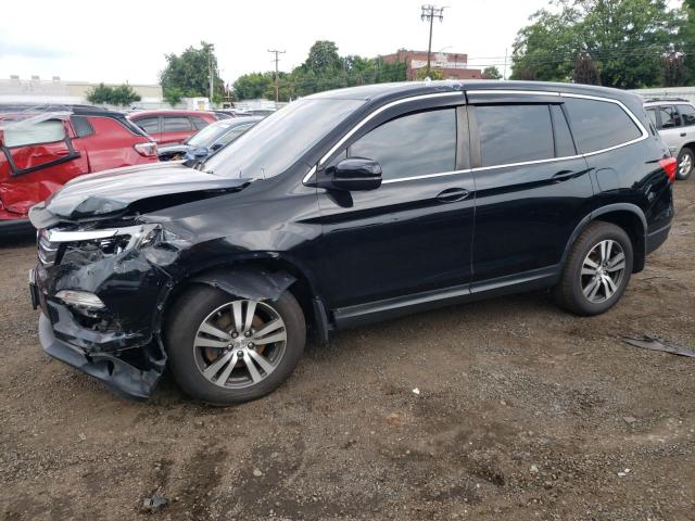 HONDA PILOT EXL 2016 with VIN 5FNYF6H57GB105652 - Photo from auction