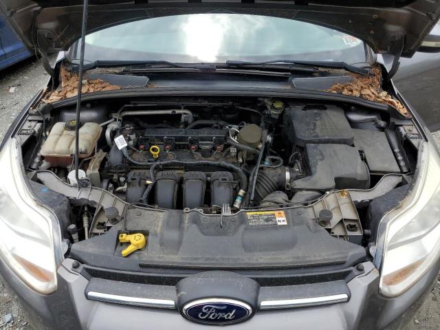 Foto 11 de la subasta – 2014 FORD FOCUS SE con VIN 1FADP3K28EL173483