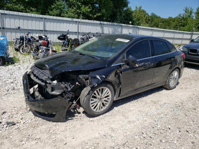 FORD FOCUS TITA 2015 with VIN 1FADP3J27FL354299 - Photo from auction