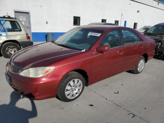 TOYOTA CAMRY LE 2002 with VIN JTDBE32K520059929 - Photo from auction