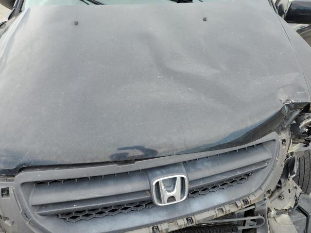 Photo 11 from auction – 2003 HONDA PILOT EX with VIN 2HKYF184X3H562672