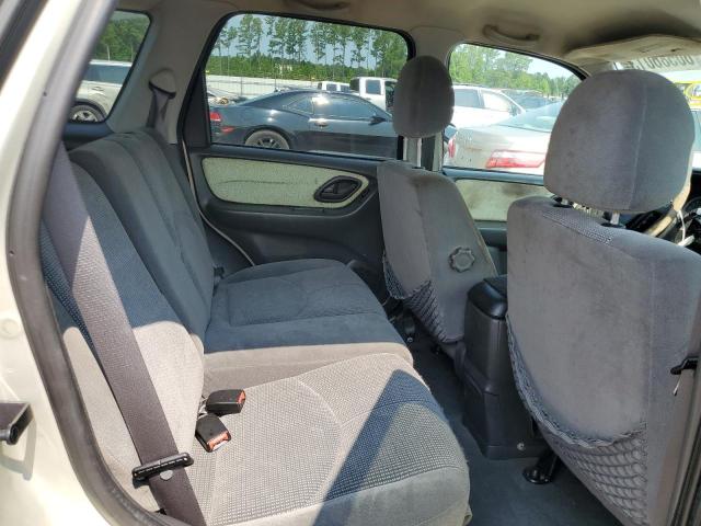 Photo 11 from auction – 2004 MAZDA TRIBUTE LX with VIN 4F2YZ04164KM19105