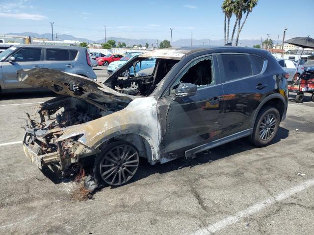 MAZDA CX-5 SPORT 2018 with VIN JM3KFBBM0J0335111 - Photo from auction