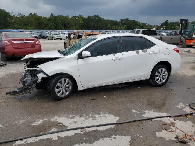 TOYOTA COROLLA L 2014 with VIN 5YFBURHEXEP123240 - Photo from auction