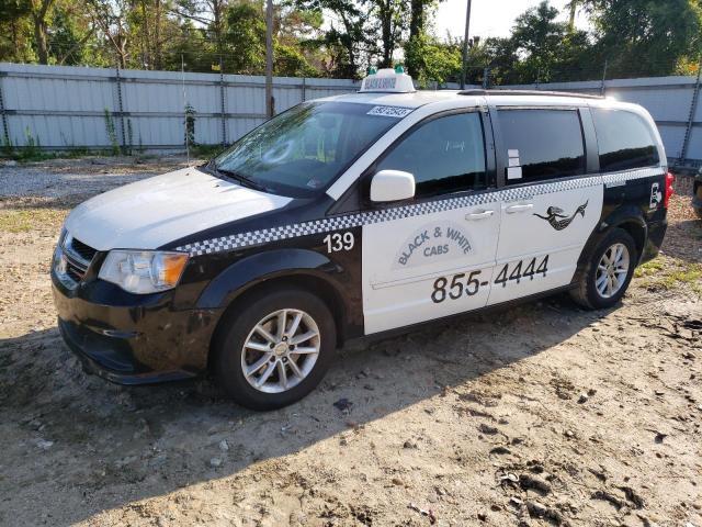 DODGE GRAND CARA 2015 with VIN 2C4RDGCG6FR574677 - Photo from auction