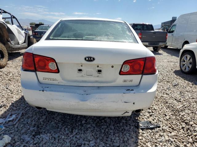 Photo 6 from auction – 2006 KIA OPTIMA LX with VIN KNAGE124565020453