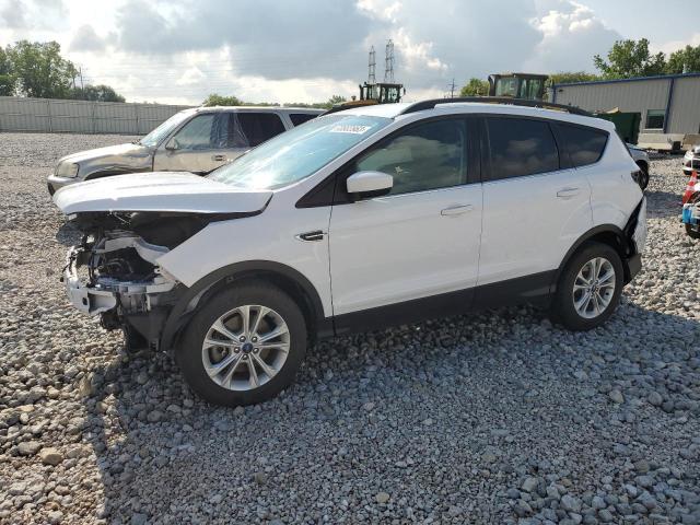 FORD ESCAPE SE 2018 with VIN 1FMCU9GD3JUC00391 - Photo from auction