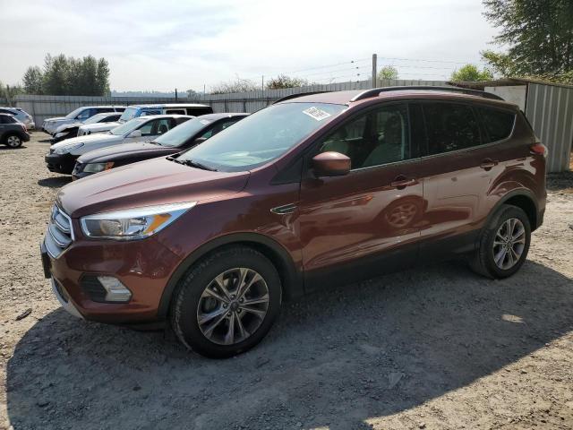FORD ESCAPE SE 2018 with VIN 1FMCU0GD0JUB16055 - Photo from auction