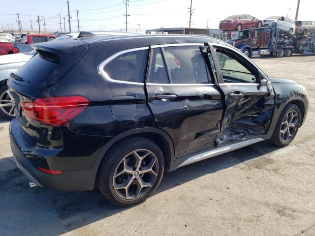 Photo 3 from auction – 2018 BMW X1 XDRIVE2 with VIN WBXHT3C30J5L26809