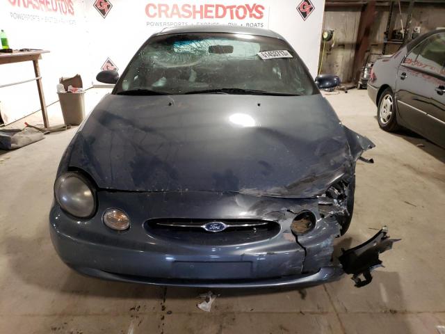 Photo 5 from auction – 1999 FORD TAURUS SE with VIN 1FAFP53U3XG241656