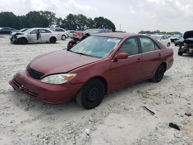 TOYOTA CAMRY LE 2002 with VIN 4T1BE32K62U580839 - Photo from auction