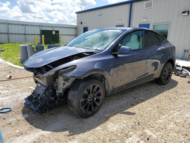 TESLA MODEL Y 2023 with VIN 7SAYGDEE5PF634008 - Photo from auction