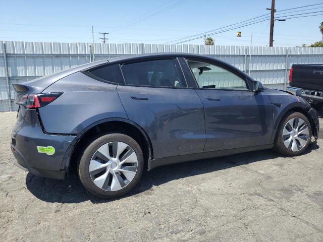 Photo 3 from auction – 2023 TESLA MODEL Y with VIN 7SAYGAEEXPF660554