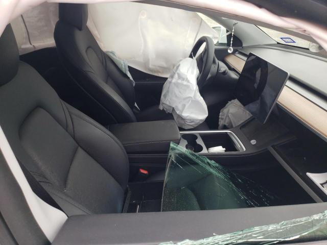 Photo 7 from auction – 2022 TESLA MODEL Y with VIN 7SAYGDEE6NF394657