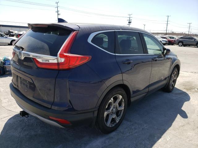 Photo 3 from auction – 2017 HONDA CR-V with VIN 7FARW1H89HE028953