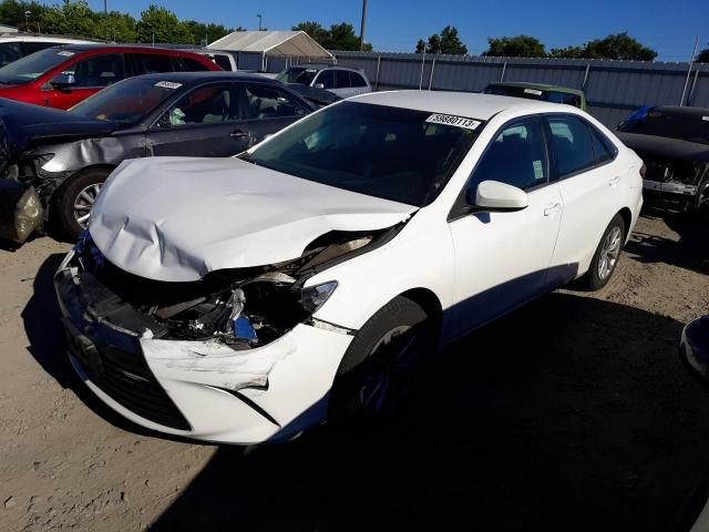 TOYOTA CAMRY LE 2017 with VIN 4T1BF1FK2HU668324 - Photo from auction