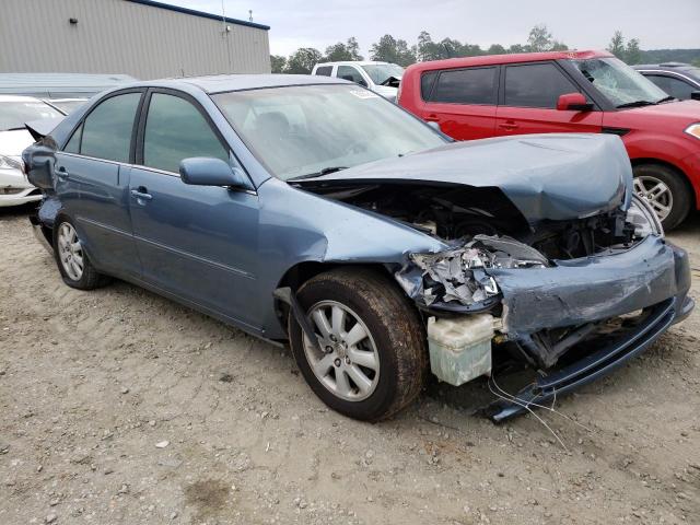 Photo 4 from auction – 2004 TOYOTA CAMRY LE with VIN 4T1BF30K14U587541