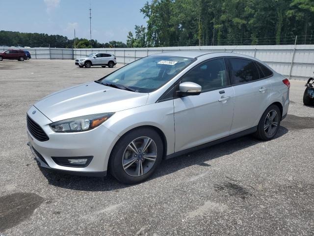 FORD FOCUS SE 2017 with VIN 1FADP3FE6HL282551 - Photo from auction