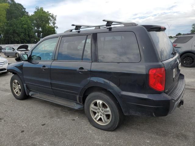 Photo 2 from auction – 2003 HONDA PILOT EX with VIN 2HKYF184X3H562672
