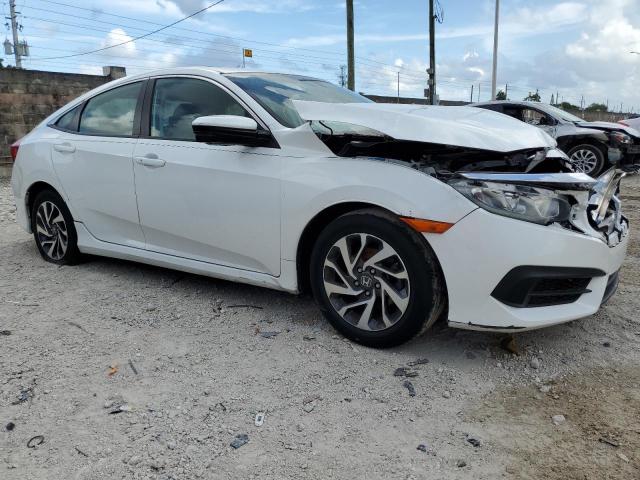 Photo 4 from auction – 2018 HONDA CIVIC EX with VIN 19XFC2F78JE037033