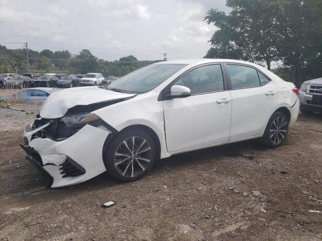 TOYOTA COROLLA L 2019 with VIN 5YFBURHE9KP893862 - Photo from auction